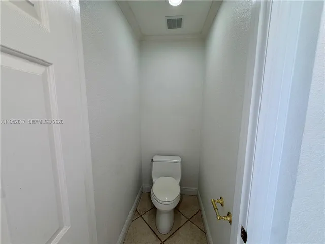 a view of a bathroom from a bathroom