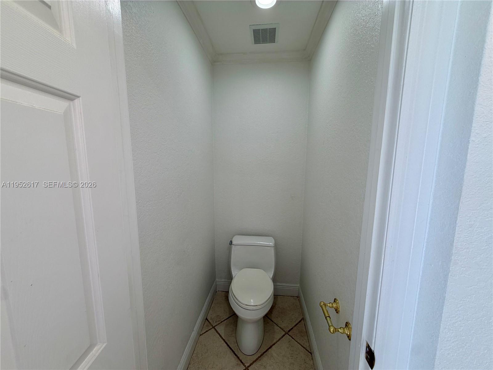 16320 Southwest 278th Street Homestead, FL 33031 - Photo 35 of 69 a white toilet sitting next to a white sink