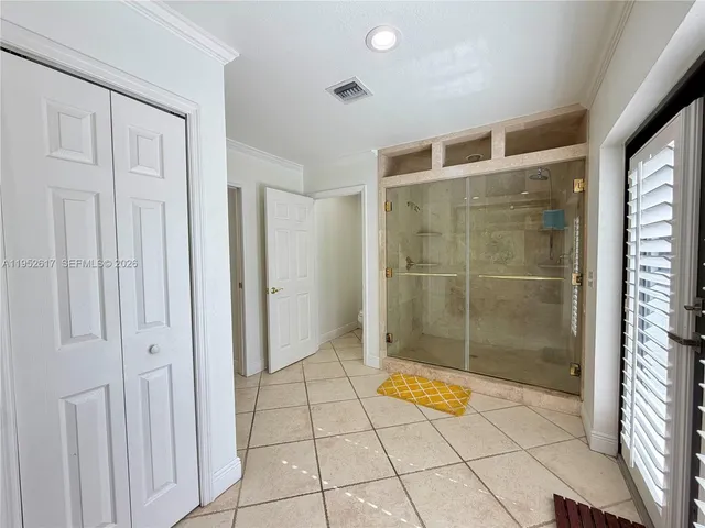 a view of a swimming pool with an outdoor space