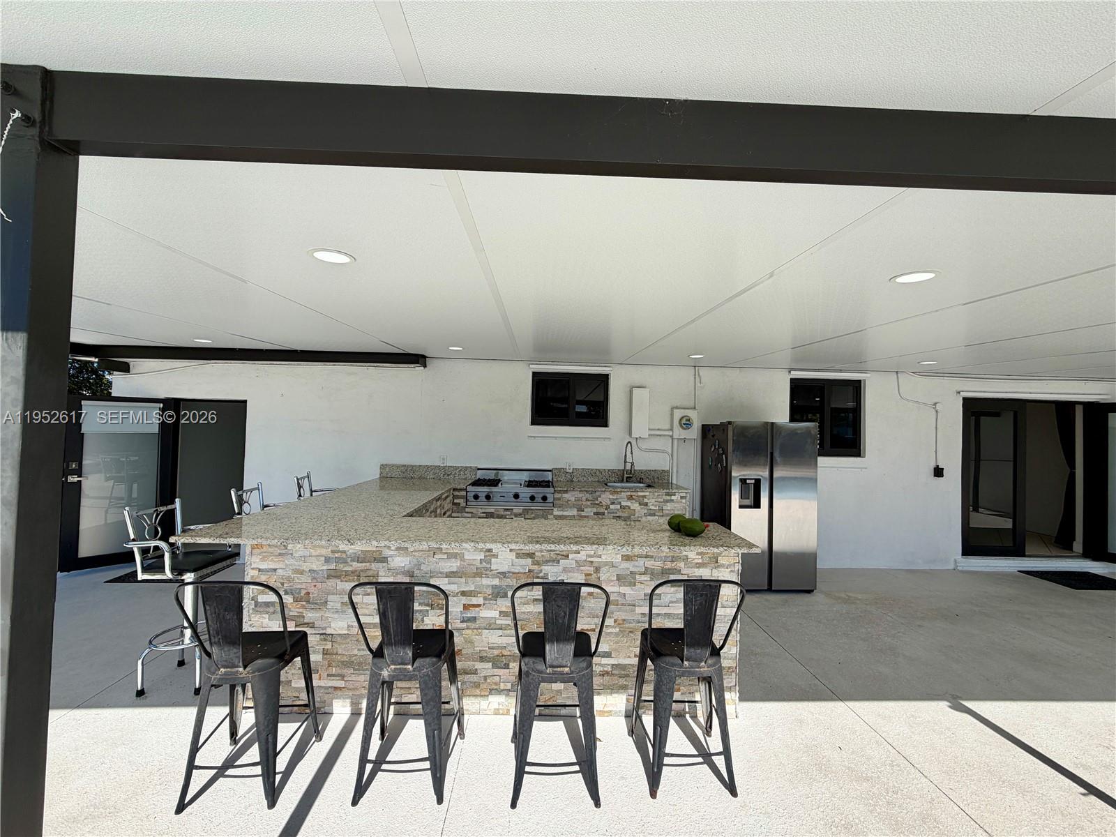 16320 Southwest 278th Street Homestead, FL 33031 - Photo 48 of 69 a view of a dining room with furniture