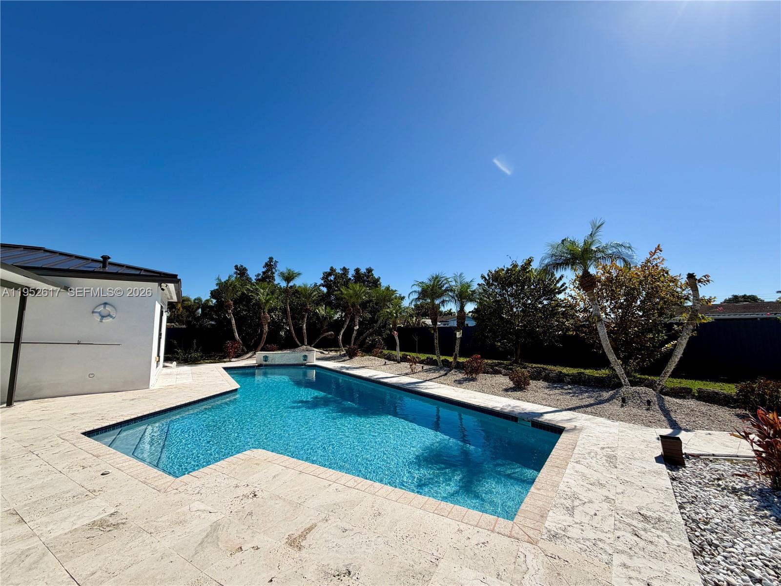 16320 Southwest 278th Street Homestead, FL 33031 - Photo 54 of 69 a view of a swimming pool with an outdoor space