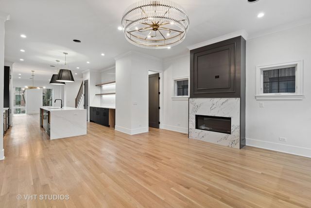 a view of staircase with white walls and a floor to ceiling window