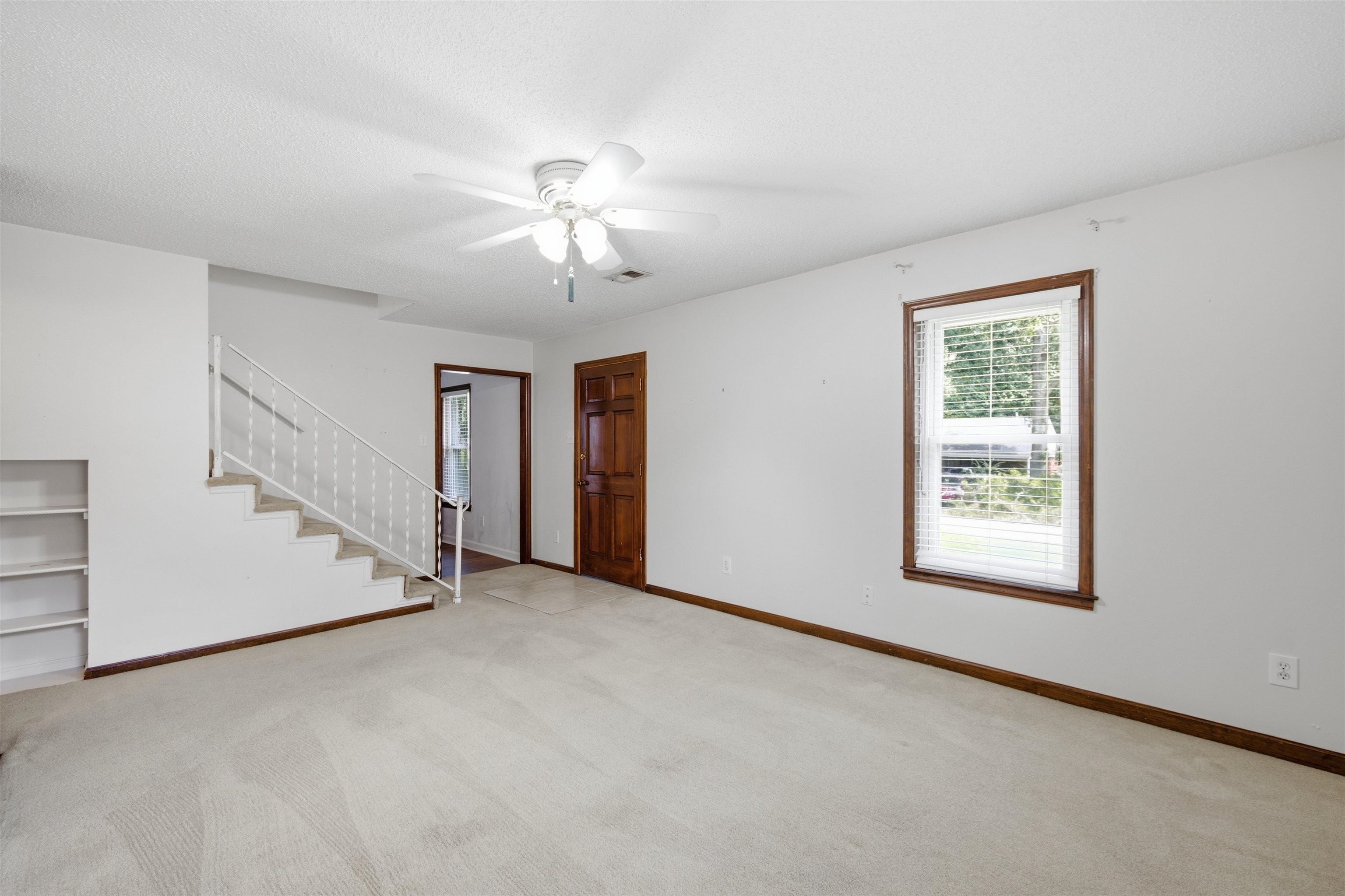 3007 Ruskin Road Bartlett, TN 38134 - Photo 16 of 37 Spacious room featuring light-toned carpeting and white walls