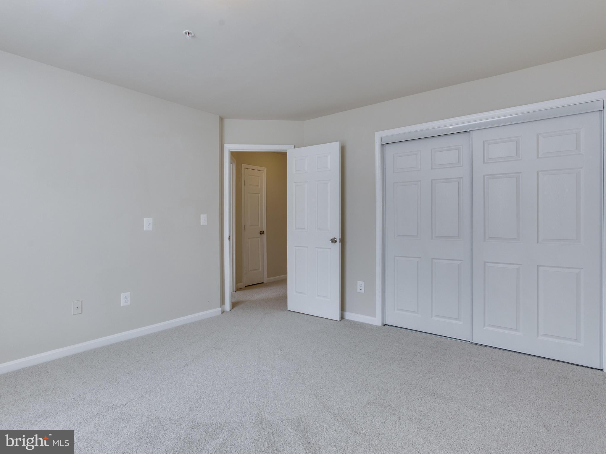 9320 Ispahan Loop Laurel, MD 20708 - Photo 22 of 30 a view of an empty room