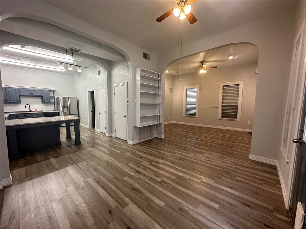 221 Commerce Street, Unit E Portland, TX 78374 - Photo 3 of 26 a view of a kitchen with a sink and cabinets