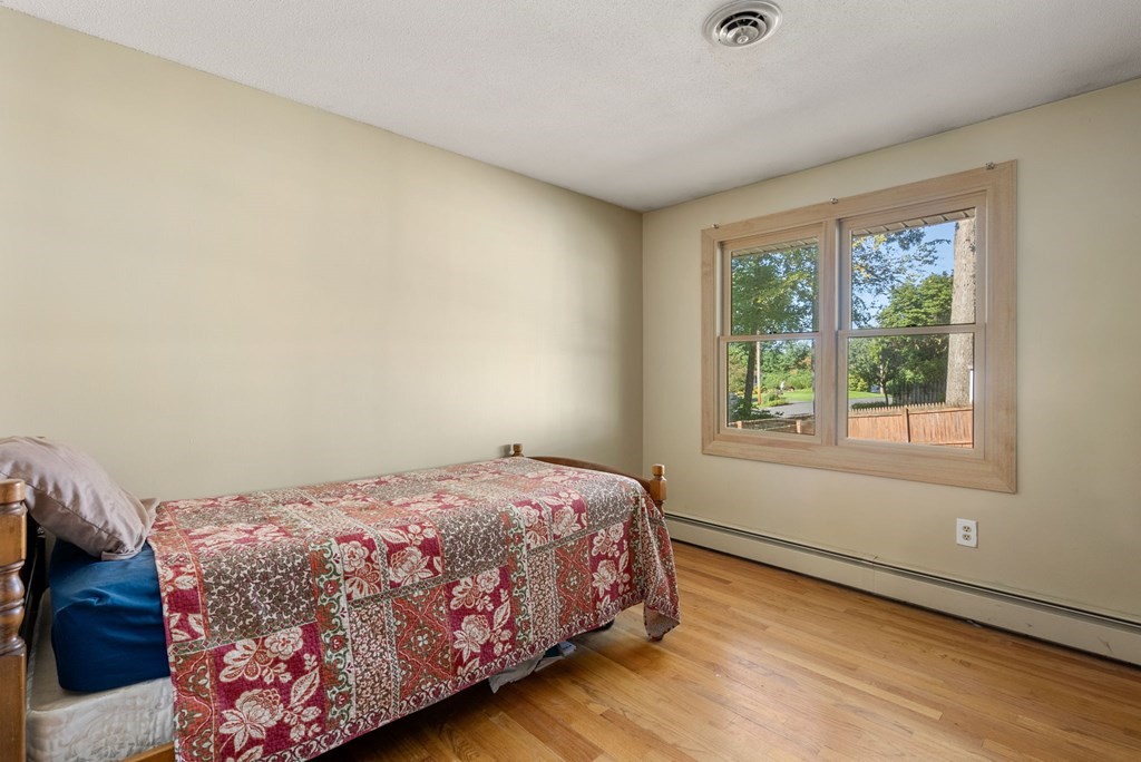 73 Northridge Road Westfield, MA 01085 - Photo 11 of 21 a bedroom with a bed and window