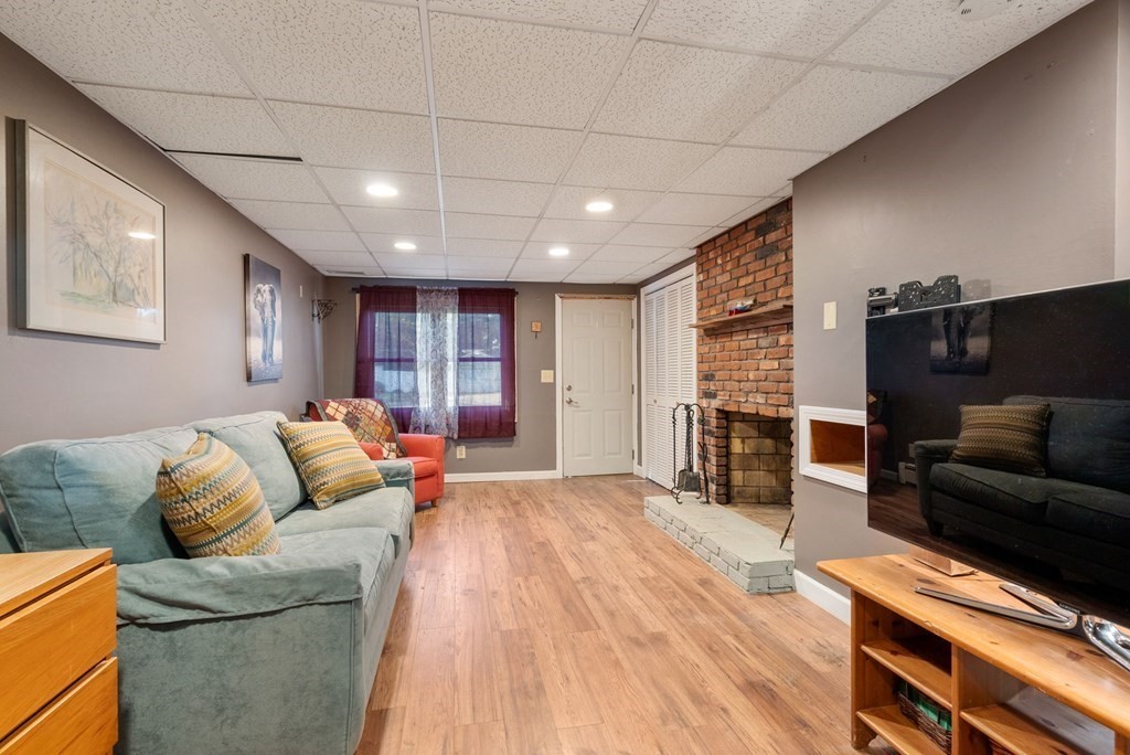 73 Northridge Road Westfield, MA 01085 - Photo 13 of 21 a living room with furniture and a flat screen tv