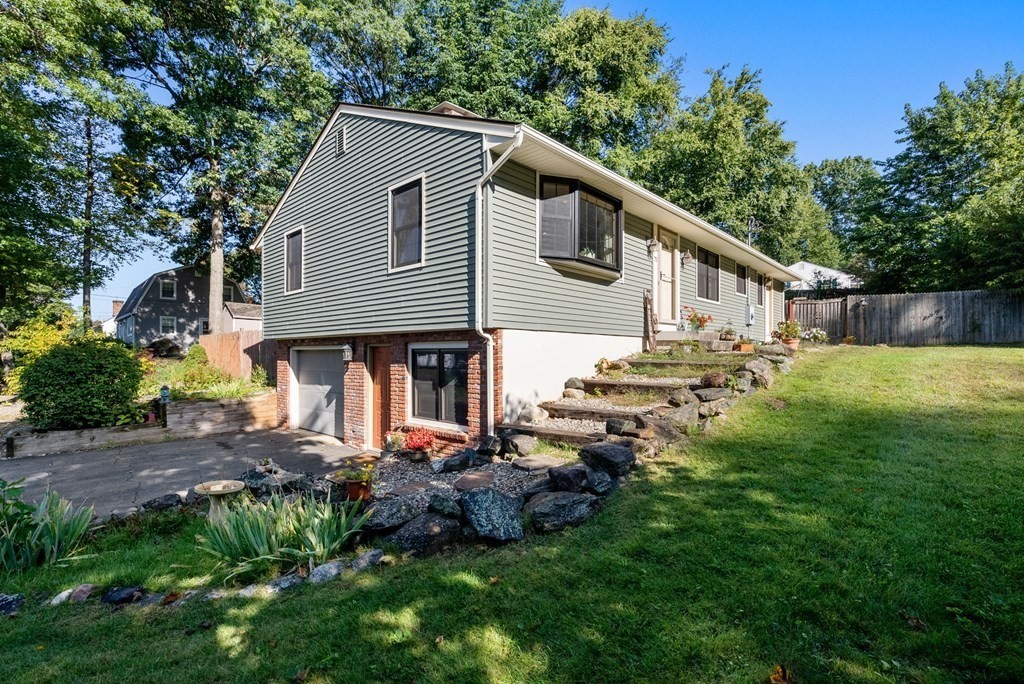 73 Northridge Road Westfield, MA 01085 - Photo 20 of 21 a view of a house with backyard and sitting area