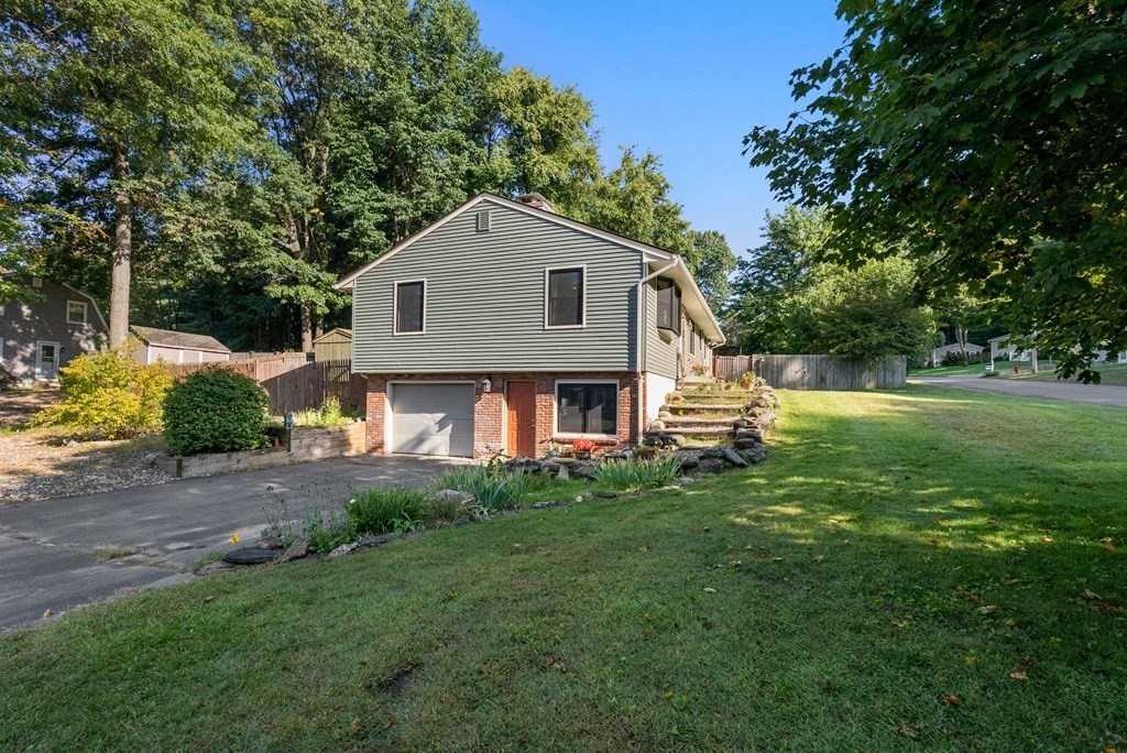 73 Northridge Road Westfield, MA 01085 - Photo 21 of 21 a front view of a house with a yard