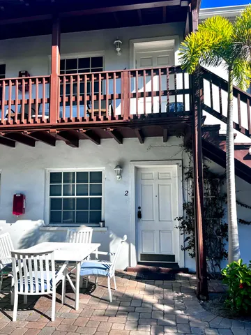 a front view of a house with a balcony