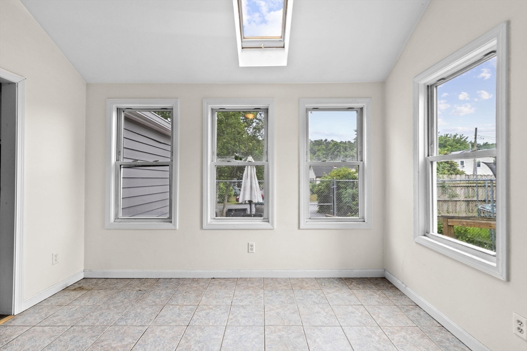 77 Olson Street Abington, MA 02351 - Photo 11 of 27 a view of an empty room with a window
