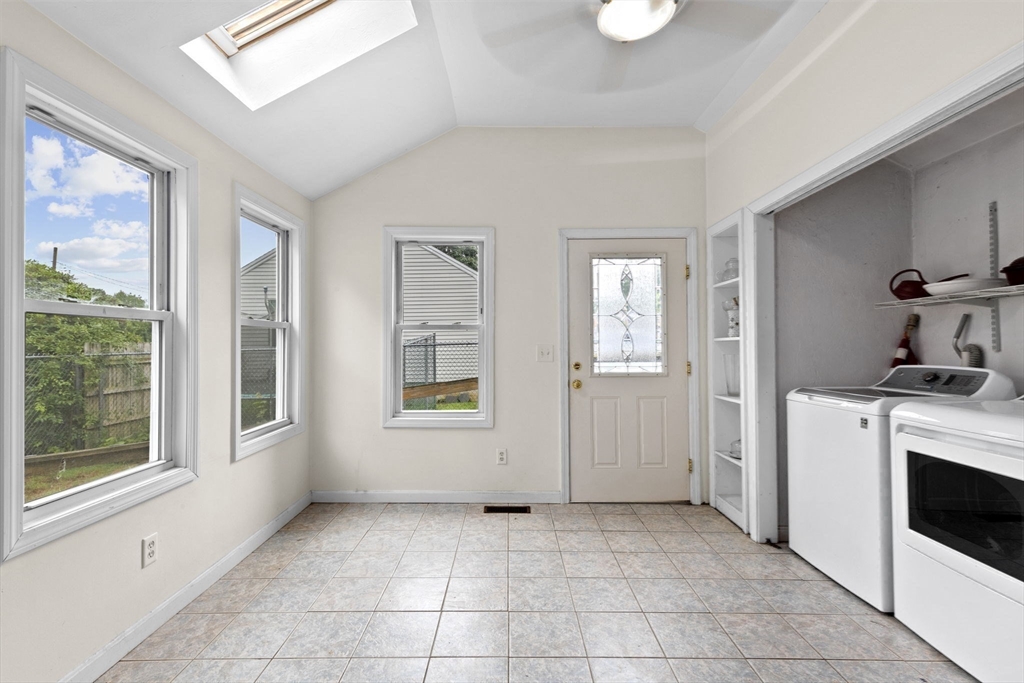 77 Olson Street Abington, MA 02351 - Photo 12 of 27 a view of a kitchen with an empty room and window