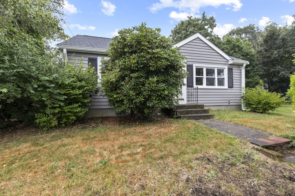 77 Olson Street Abington, MA 02351 - Photo 22 of 27 a yellow and red house sitting in front of a yard