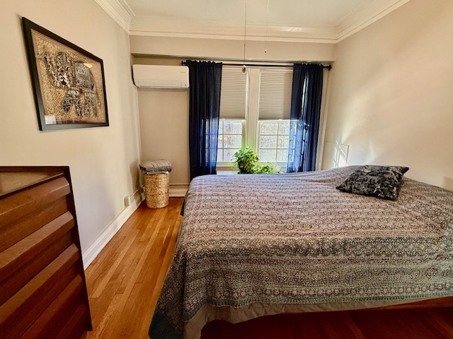 307 North Prairie Street, Unit 9 Champaign, IL 61820 - Photo 15 of 41 a bedroom with a bed and a window