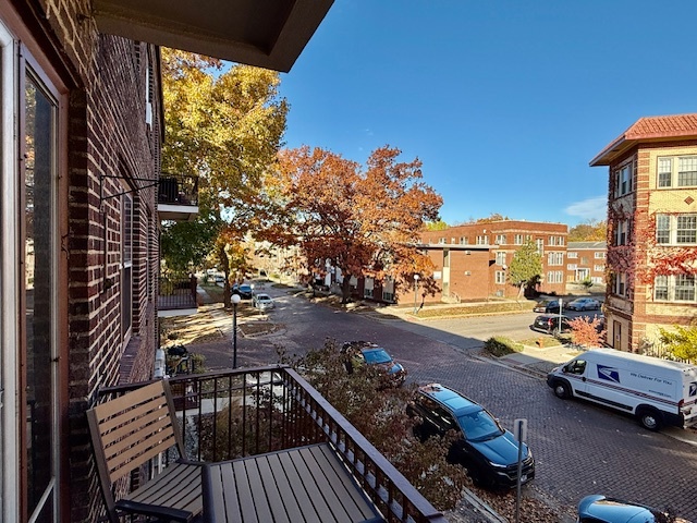307 North Prairie Street, Unit 9 Champaign, IL 61820 - Photo 26 of 41 a view of a balcony with chairs