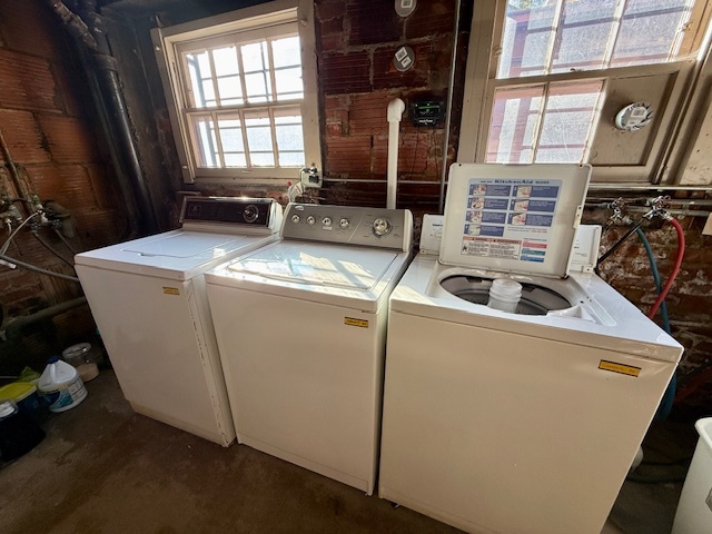 307 North Prairie Street, Unit 9 Champaign, IL 61820 - Photo 32 of 41 a utility room with dryer and washer