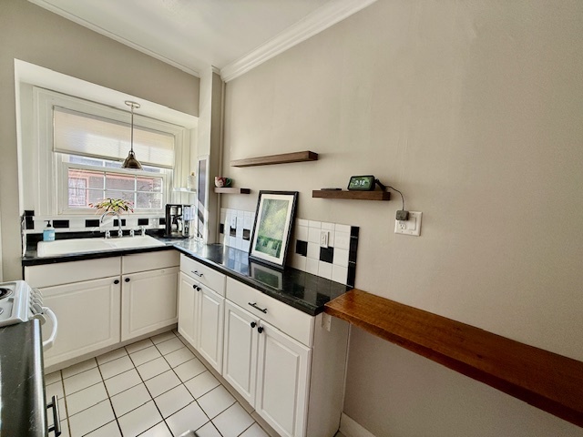 307 North Prairie Street, Unit 9 Champaign, IL 61820 - Photo 9 of 41 a kitchen with stainless steel appliances a sink and cabinets