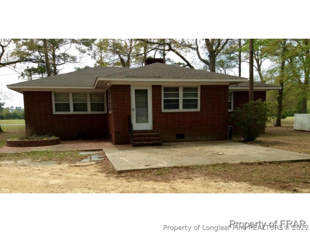 298 Magnolia Church Road Stedman, NC 28391 - Photo 32 of 33 a view of the house with a patio