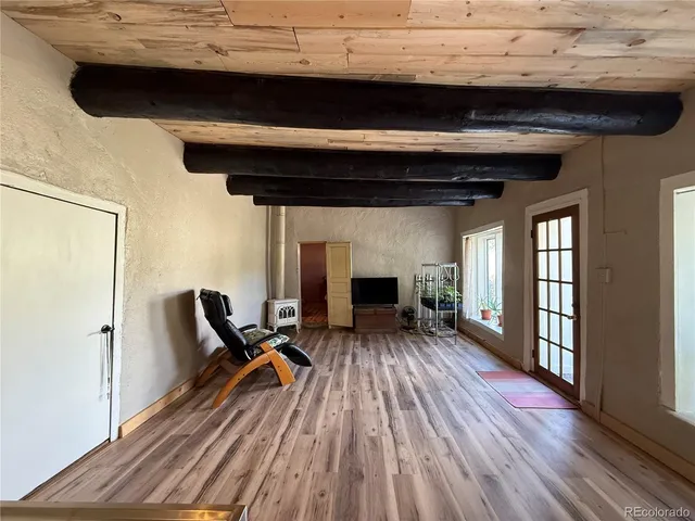 a view of livingroom with furniture and fireplace