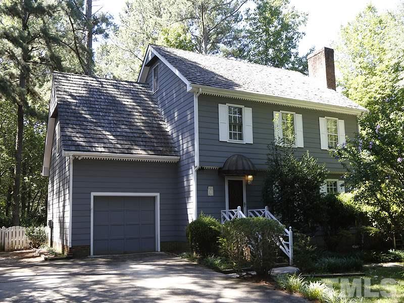 312 Baytree Lane Raleigh, NC 27615 - Photo 1 of 12 a front view of a house with garden