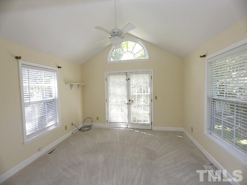 312 Baytree Lane Raleigh, NC 27615 - Photo 4 of 12 a view of an empty room with a window