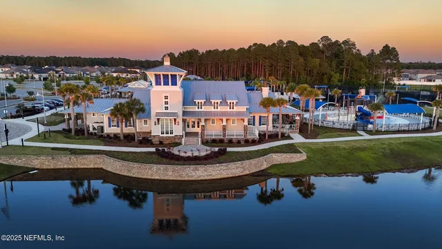 a view of swimming pool with outdoor seating