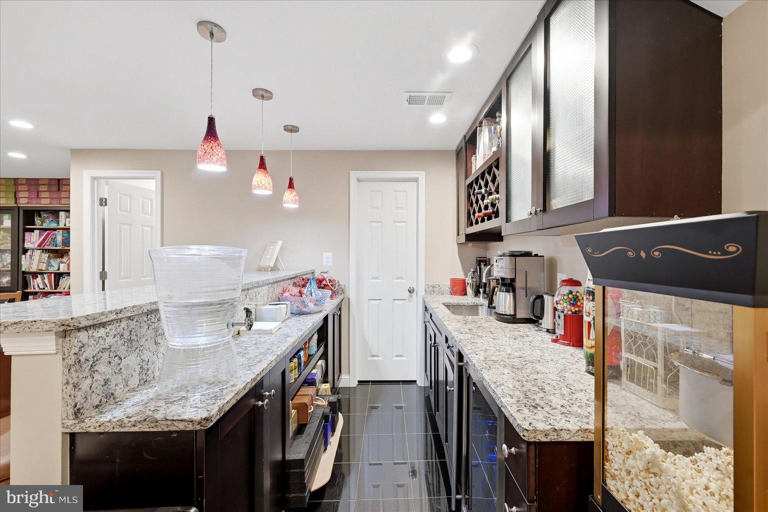 911 Riva Ridge Drive Great Falls, VA 22066 - Photo 27 of 55 Modern kitchen with stylish finishes.