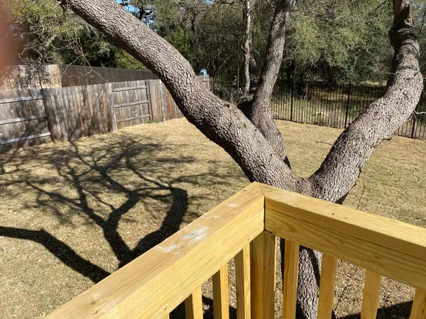 a view of a house with a tree