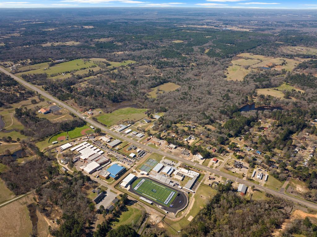 Tbd Nix Street Daingerfield, TX 75638 - Photo 11 of 16 an aerial view of residential houses with outdoor space