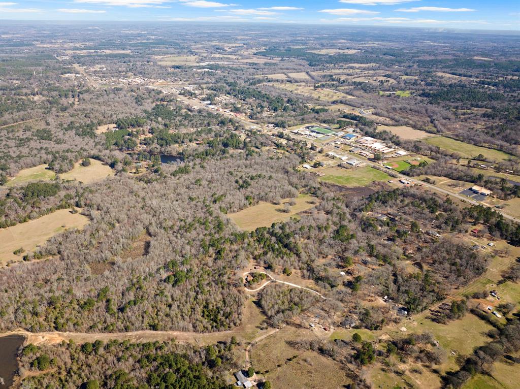 Tbd Nix Street Daingerfield, TX 75638 - Photo 14 of 16 an aerial view of residential houses with outdoor space