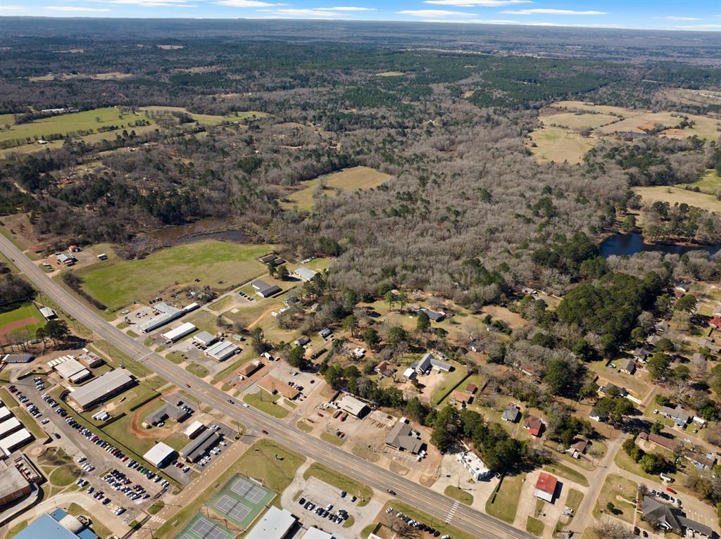 Tbd Nix Street Daingerfield, TX 75638 - Photo 4 of 16 an aerial view of residential houses with outdoor space
