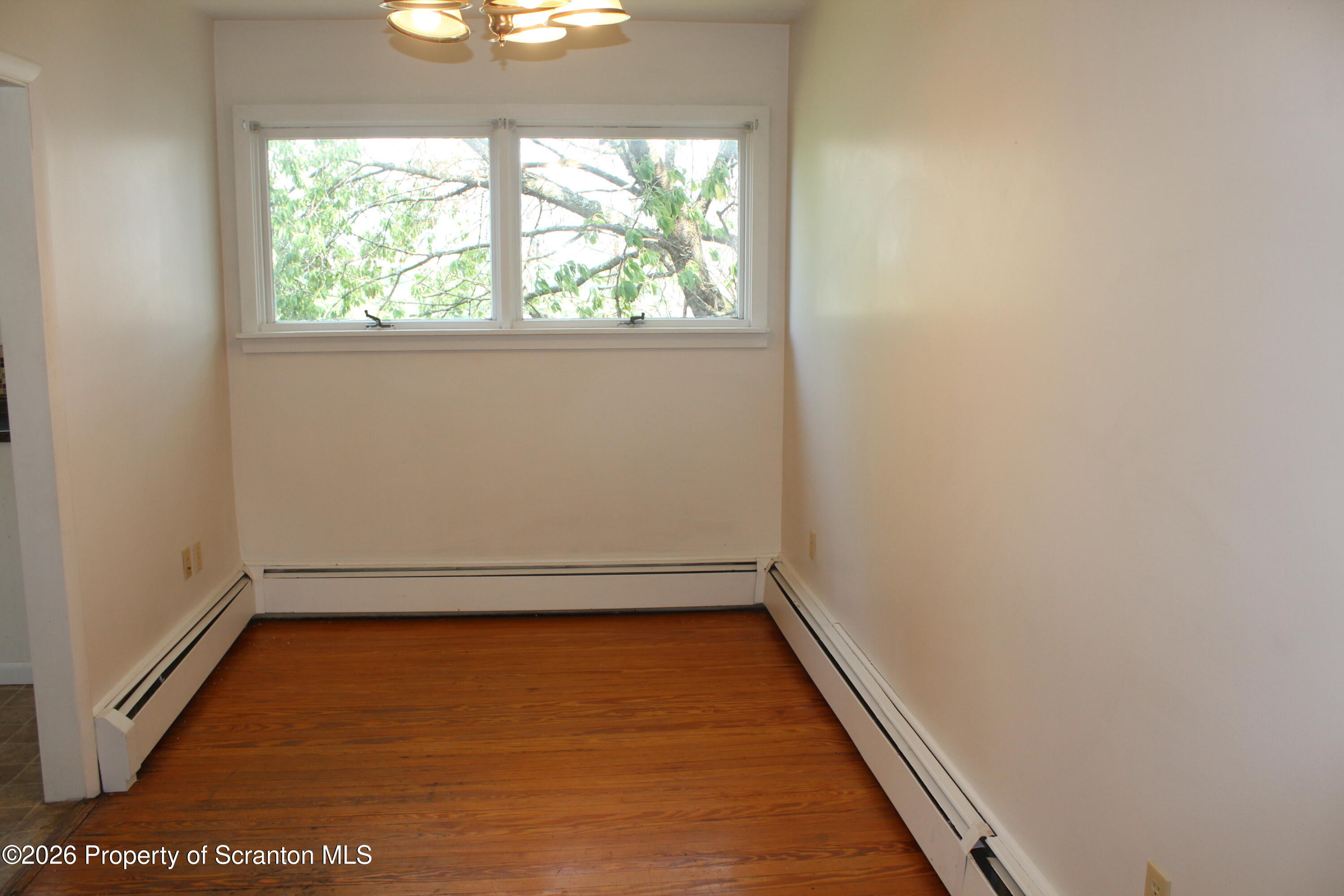 1608 Prospect Avenue Scranton, PA 18505 - Photo 7 of 30 an empty room with a window