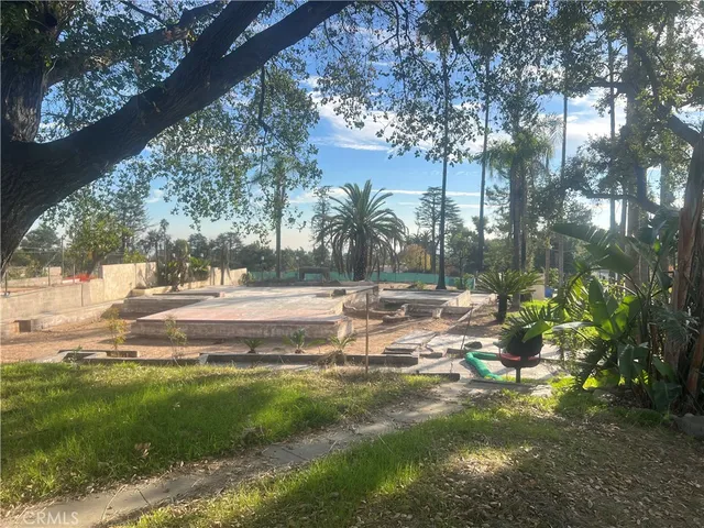 a view of backyard with green space