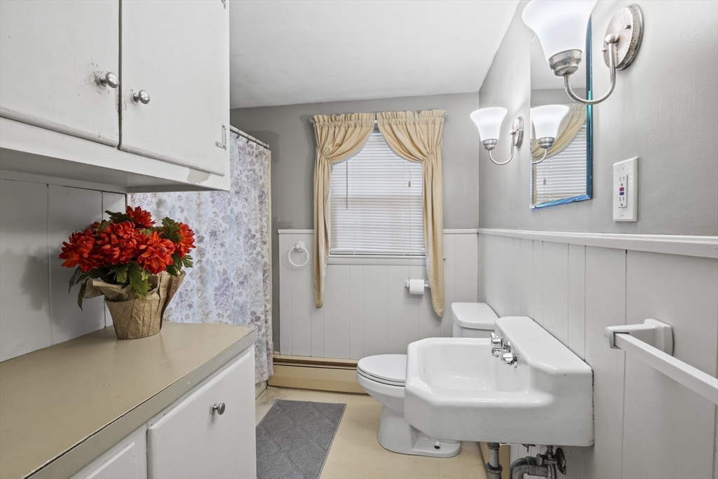 78 2nd Island Road Webster, MA 01570 - Photo 18 of 28 a bathroom with a sink and a mirror