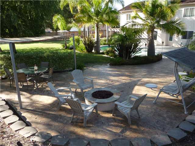 4603 Sheridan Road Oceanside, CA 92056 - Photo 4 of 25 Out door gas fire pit with custom stamp concrete.