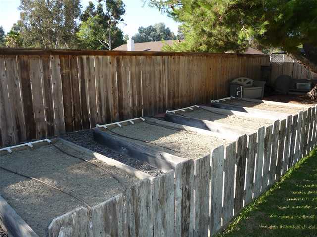 4603 Sheridan Road Oceanside, CA 92056 - Photo 6 of 25 Raised garden beds with irrigation drip system.