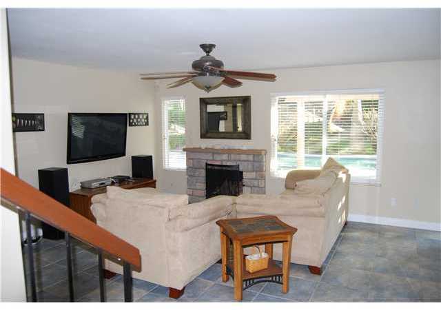 4603 Sheridan Road Oceanside, CA 92056 - Photo 25 of 25 The family room is adjacent to the kitchen for an open floor plan. All new double paned vinyl windows throughout the house.