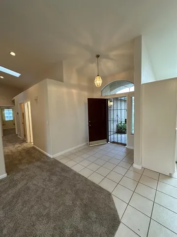 a view of gallery with wooden floor