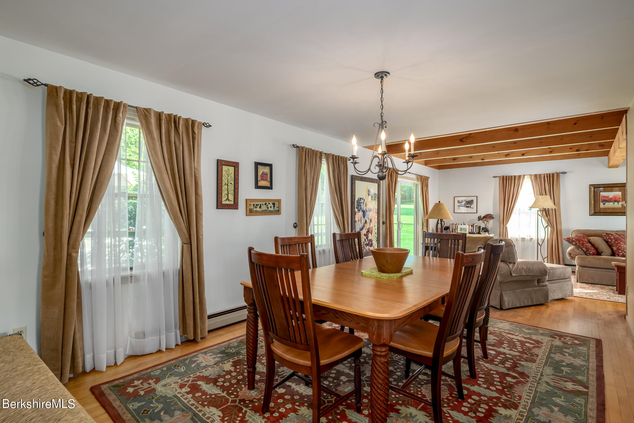 69 County Road Pownal, VT 05261 - Photo 17 of 33 a dining room with furniture window and wooden floor