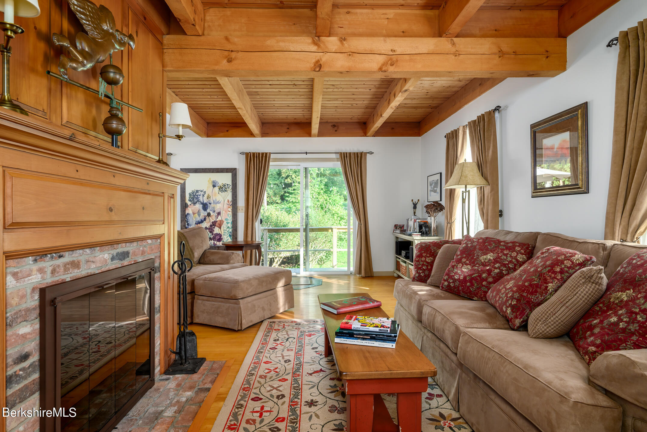 69 County Road Pownal, VT 05261 - Photo 19 of 33 a living room with furniture and a fireplace