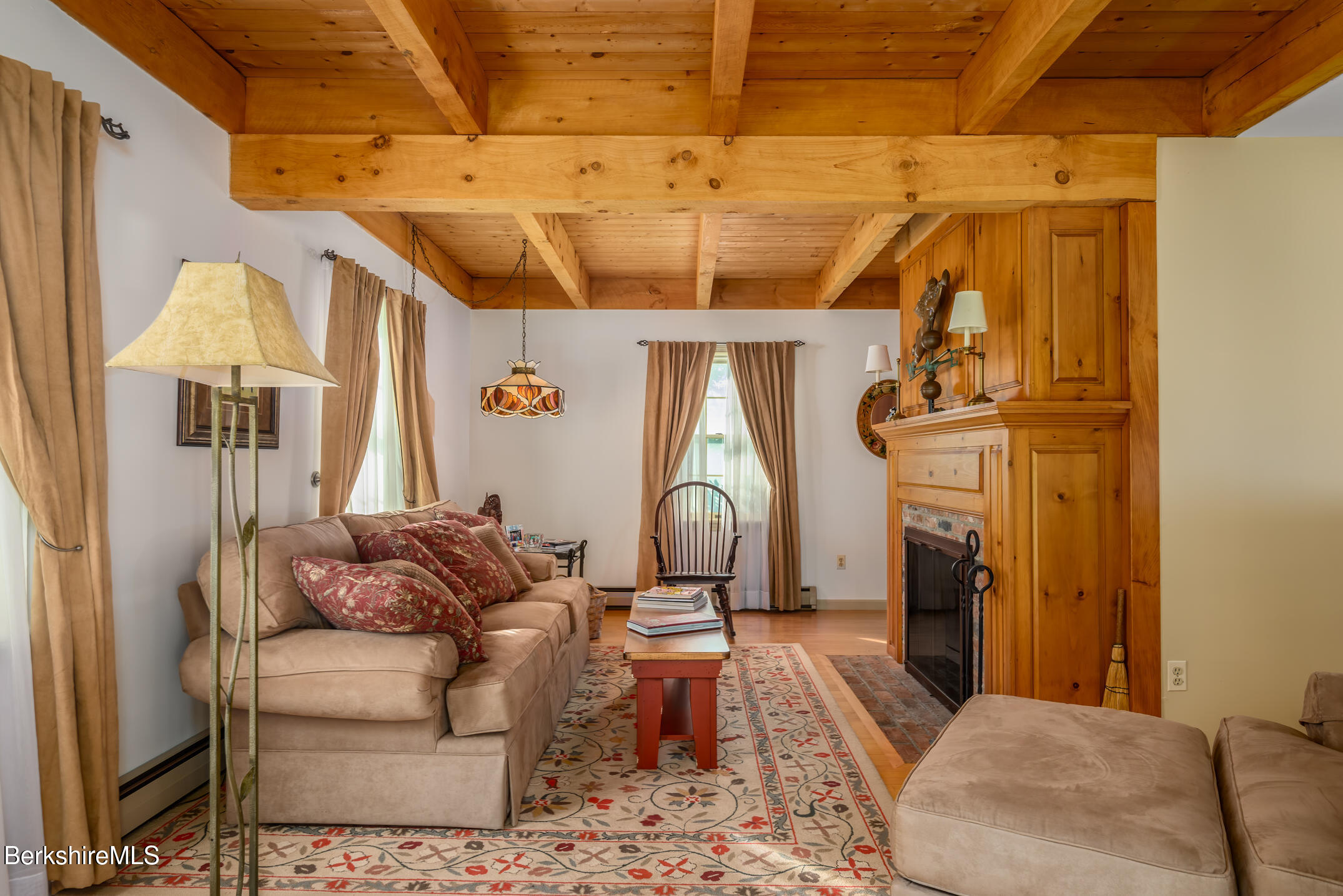 69 County Road Pownal, VT 05261 - Photo 20 of 33 a living room with furniture and a chandelier