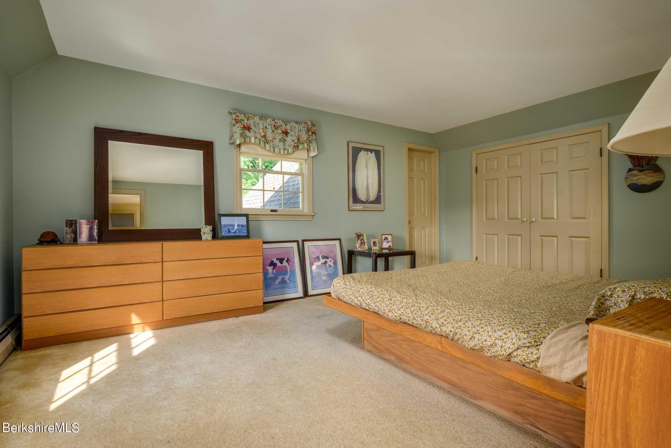 69 County Road Pownal, VT 05261 - Photo 28 of 33 a bedroom with a bed and a dresser