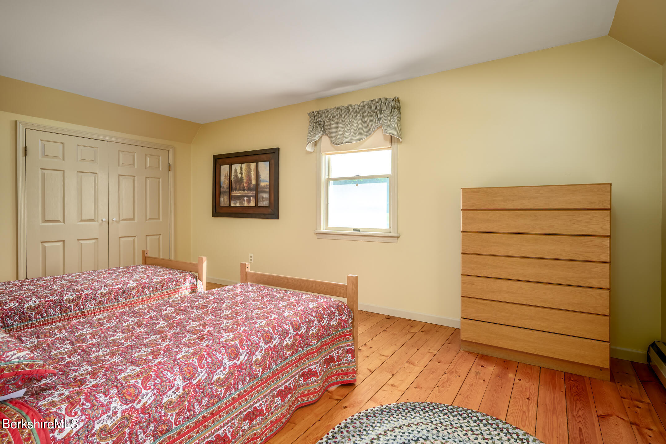 69 County Road Pownal, VT 05261 - Photo 31 of 33 a bedroom with a bed and a dresser