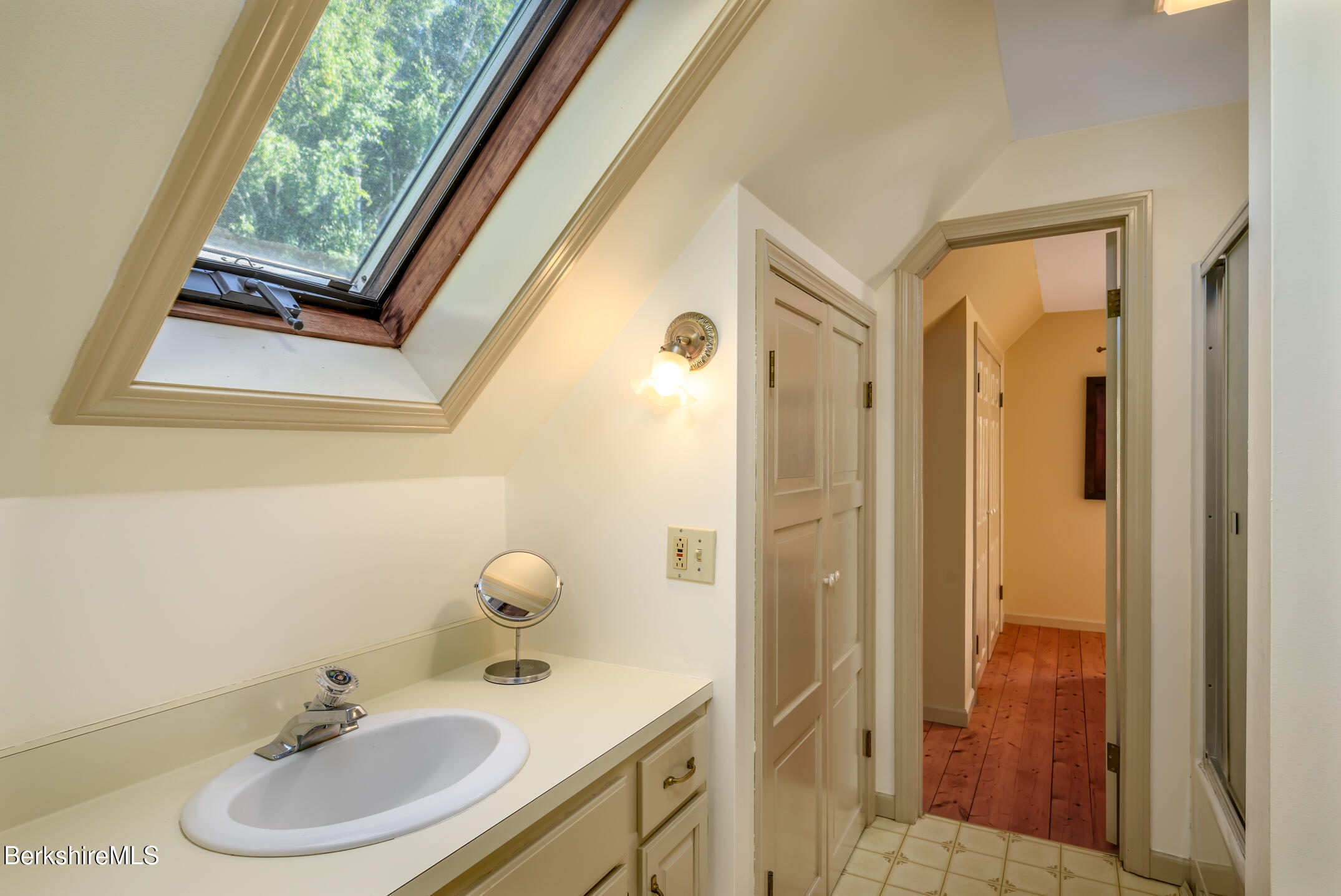 69 County Road Pownal, VT 05261 - Photo 32 of 33 a bathroom with a sink and a mirror