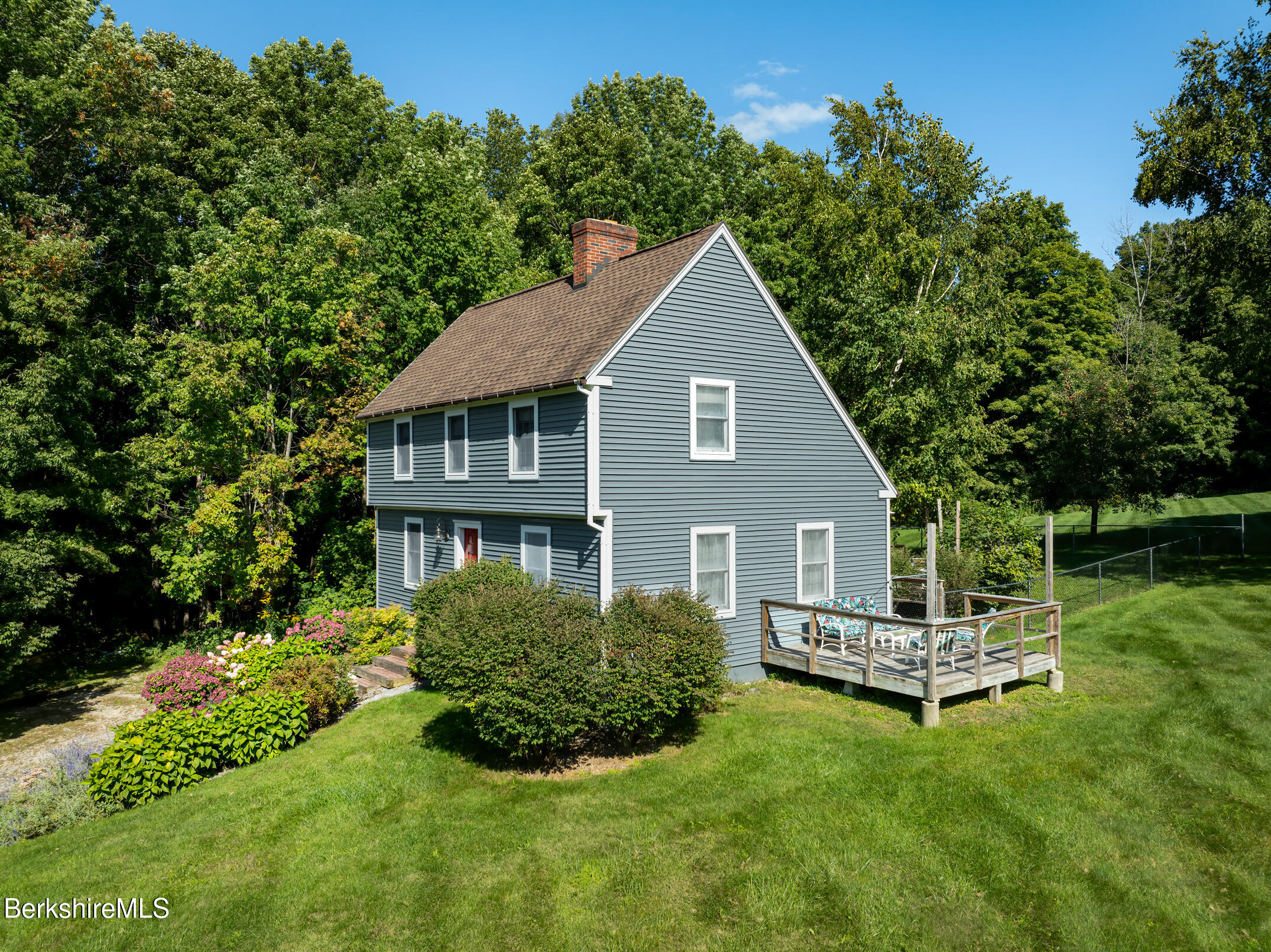 69 County Road Pownal, VT 05261 - Photo 4 of 33 a house view with a garden space