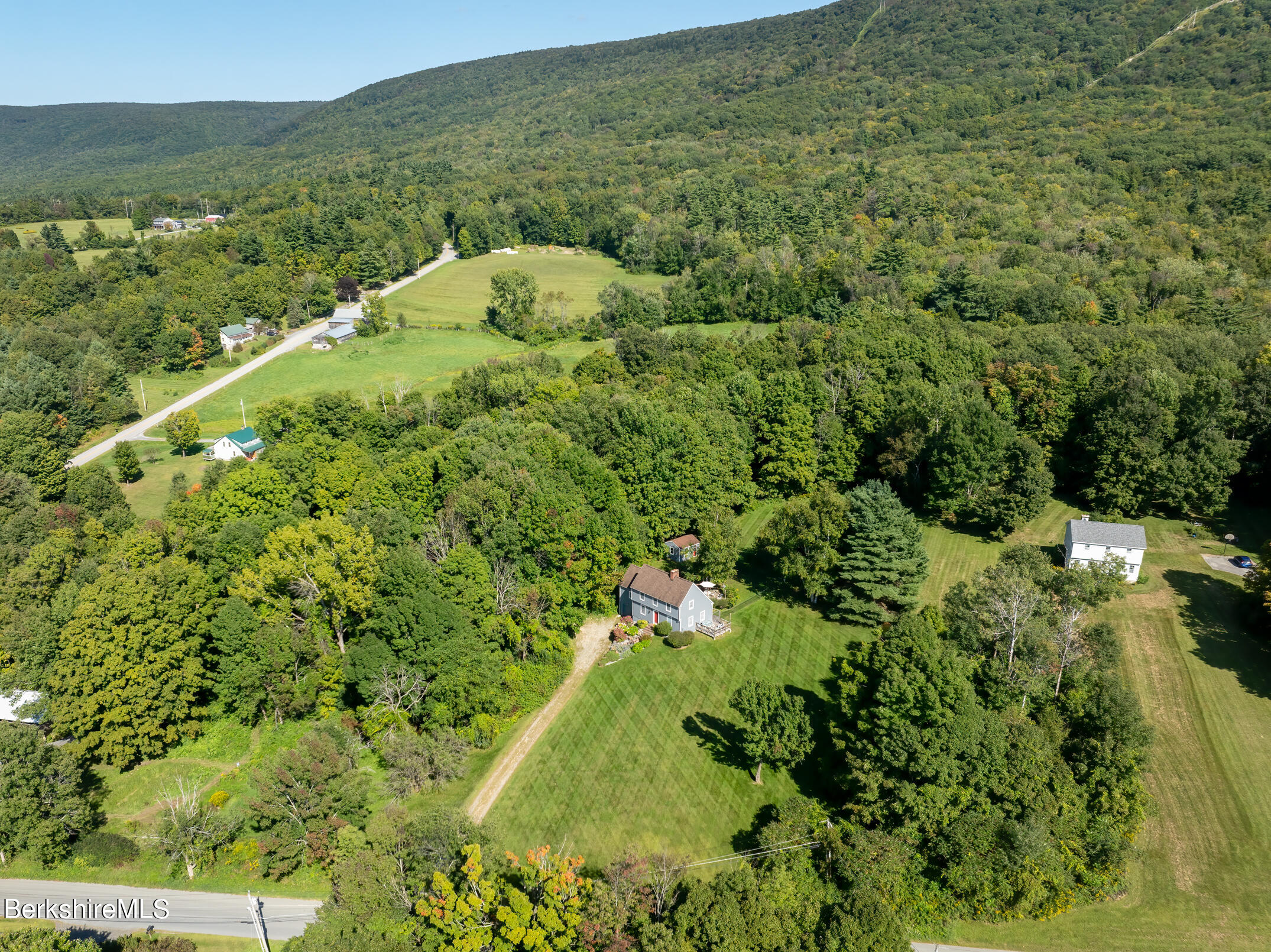 69 County Road Pownal, VT 05261 - Photo 8 of 33 a view of a green field with lots of bushes