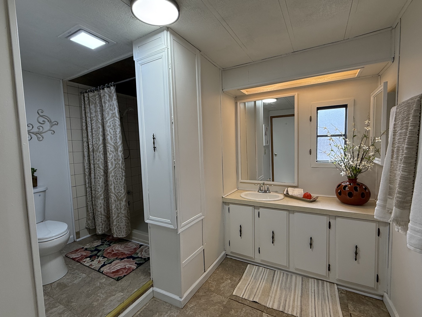 608 Tanglewood Road Matteson, IL 60443 - Photo 14 of 28 a bathroom with a double vanity sink toilet and shower