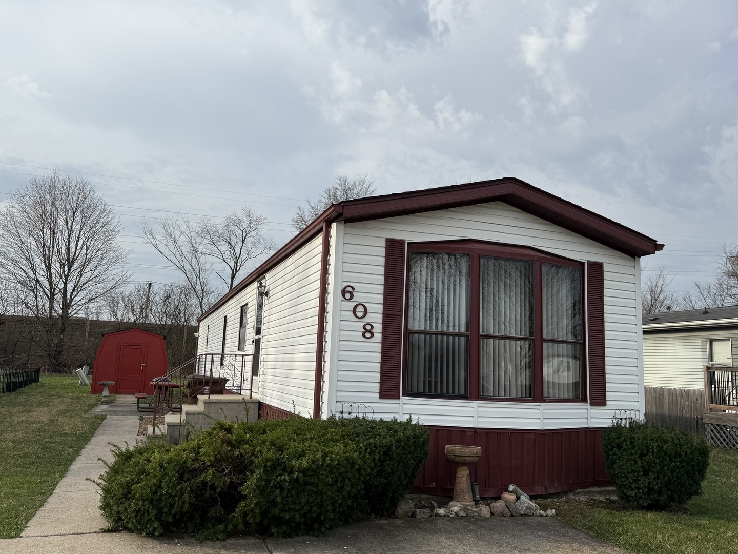 608 Tanglewood Road Matteson, IL 60443 - Photo 27 of 28 a front view of a house with an outdoor space