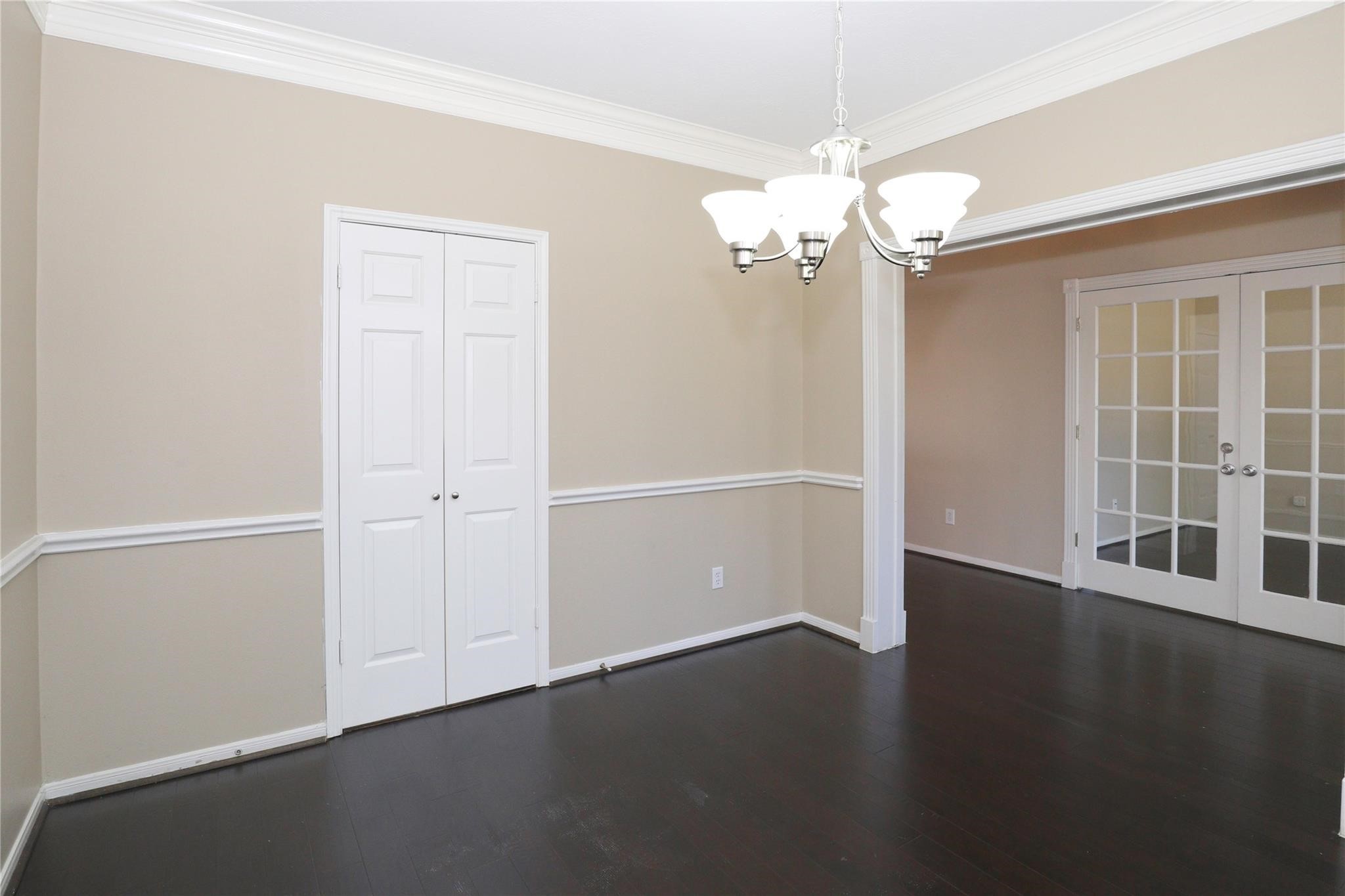 23207 Olive Ridge Court Katy, TX 77494 - Photo 15 of 45 wooden floor in an empty room with a window