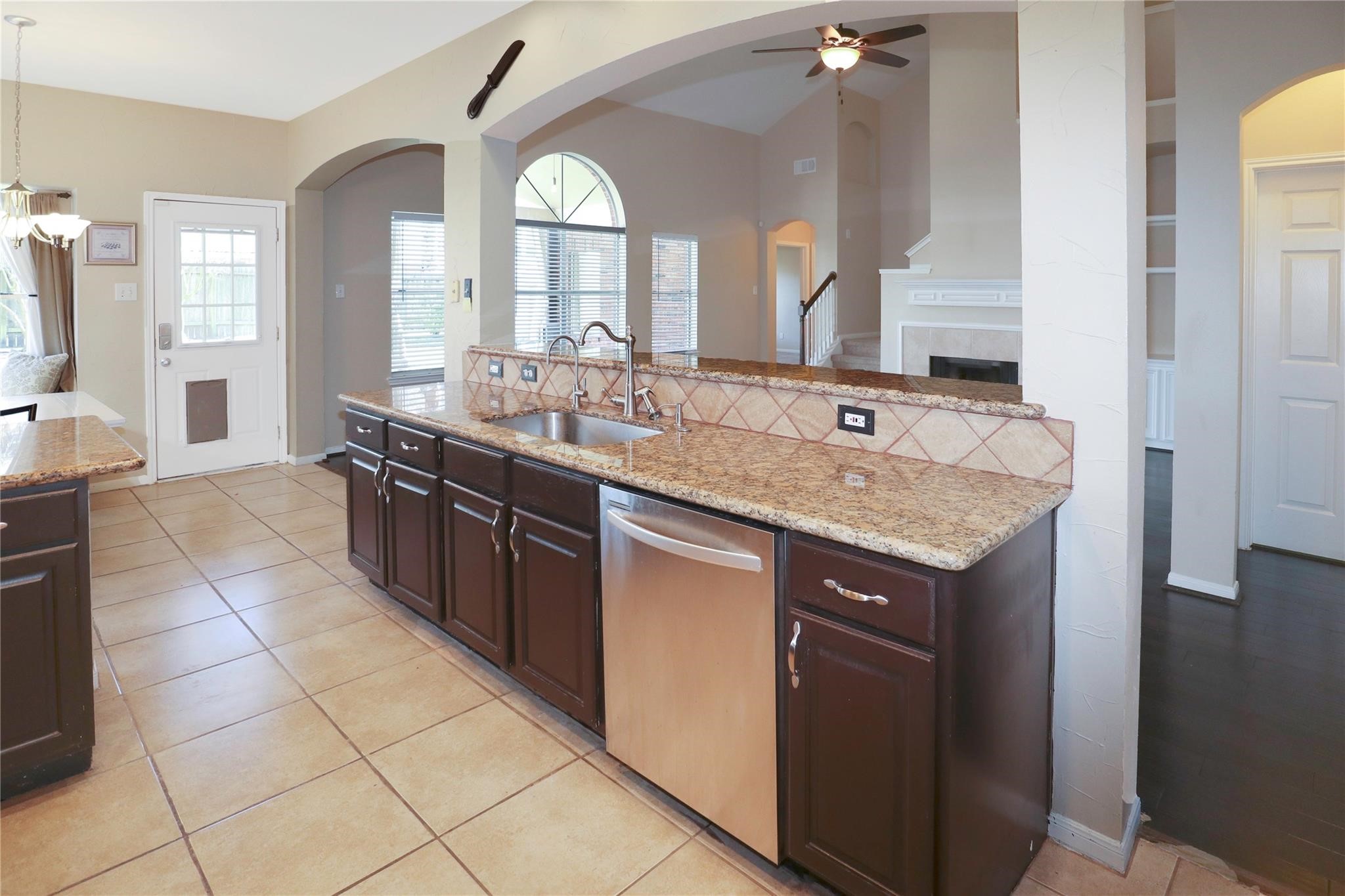 23207 Olive Ridge Court Katy, TX 77494 - Photo 24 of 45 a kitchen with a sink and a mirror